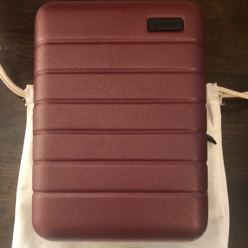 Away mini luggage in Brick Red